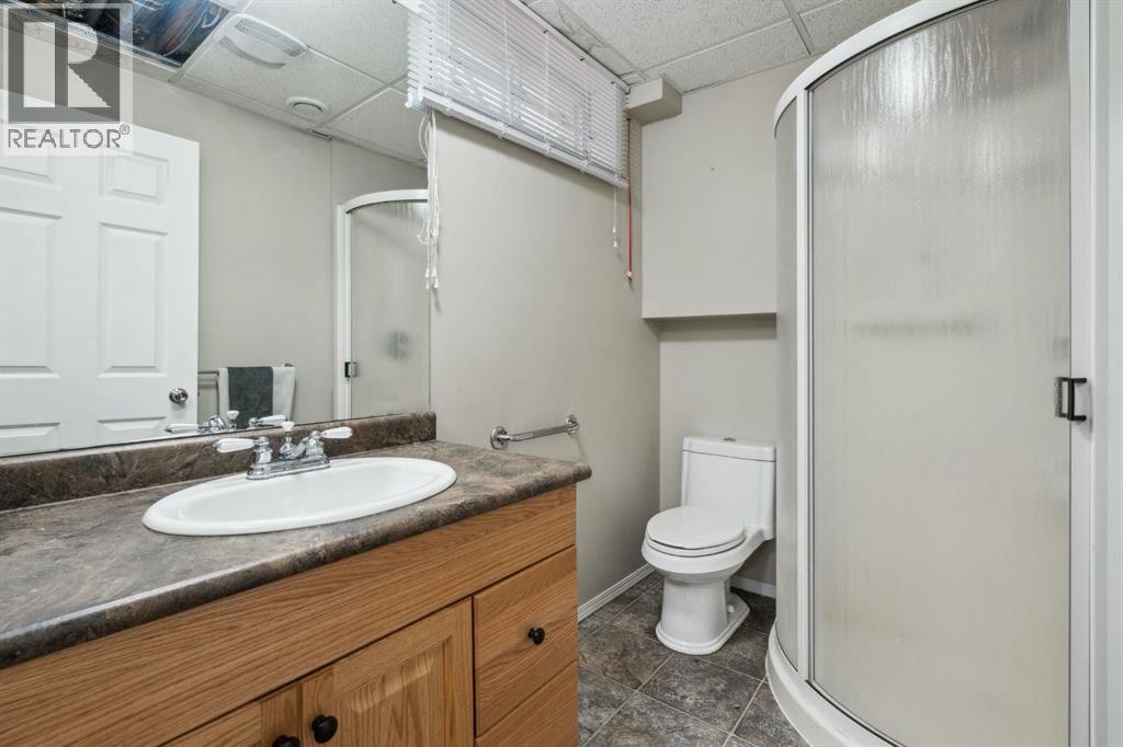 Photo 39 of 79 Woodbrook Road Sw, Calgary AB