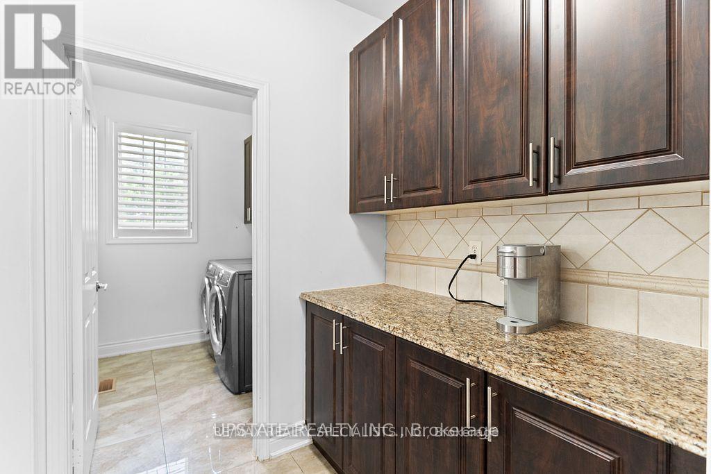 Photo 18 of 104 Treeline Boulevard, Brampton ON