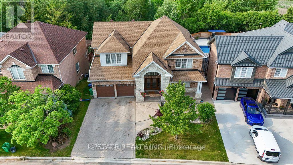 Photo 2 of 104 Treeline Boulevard, Brampton ON