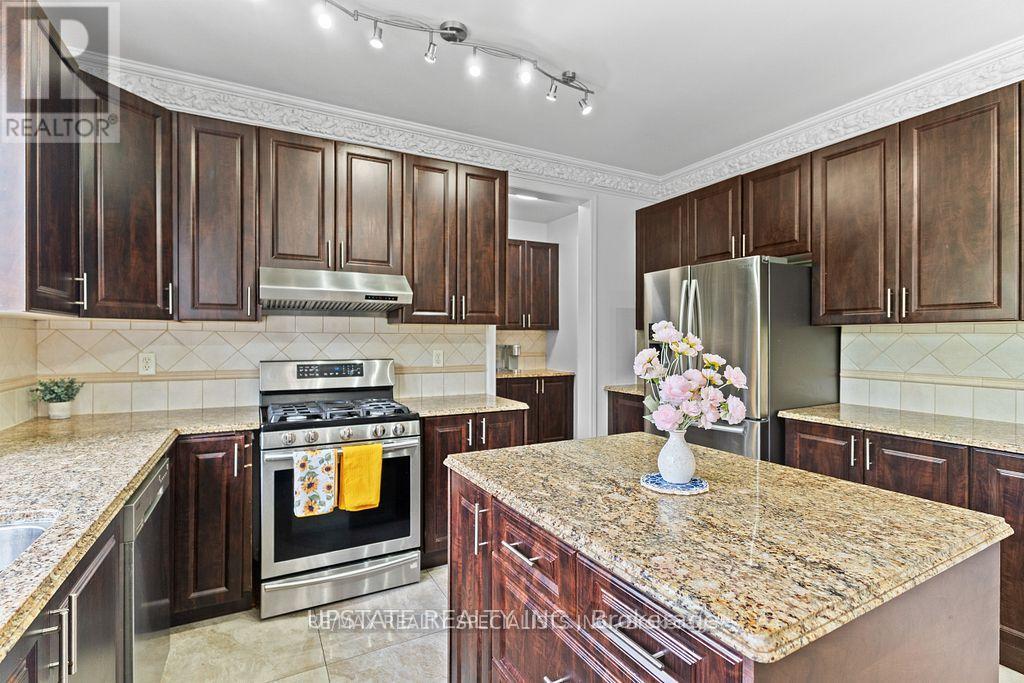 Photo 12 of 104 Treeline Boulevard, Brampton ON