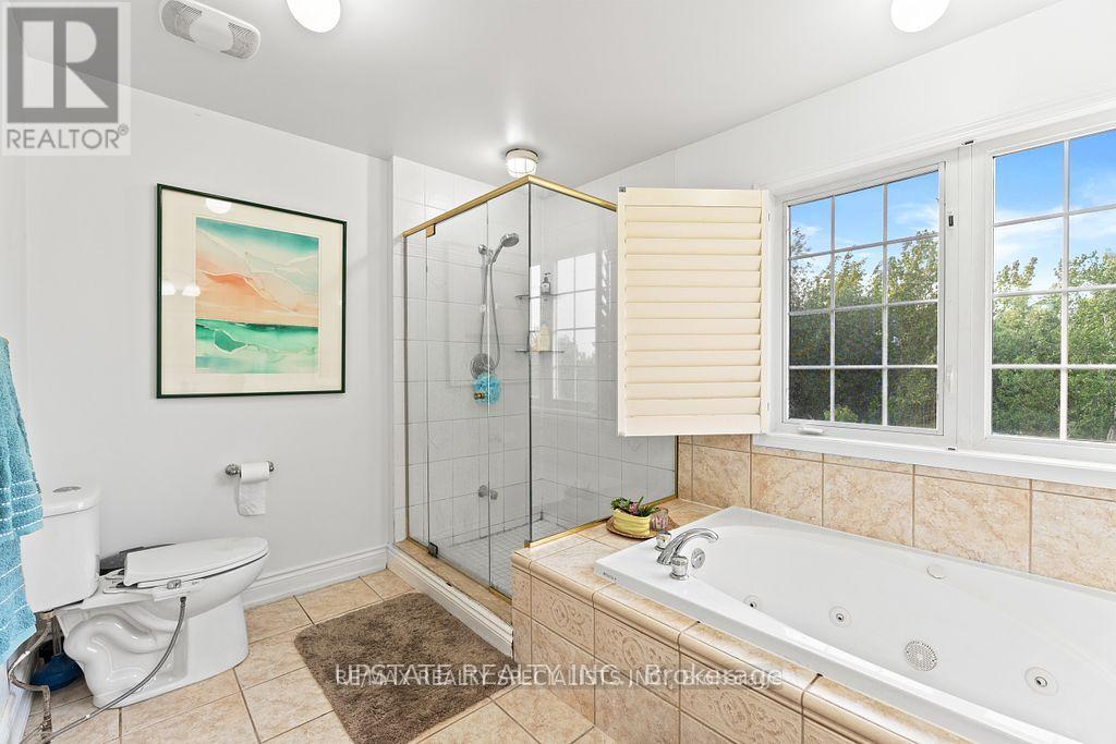 Photo 27 of 104 Treeline Boulevard, Brampton ON