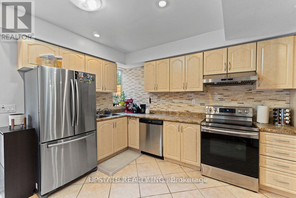 Photo 38 of 104 Treeline Boulevard, Brampton ON
