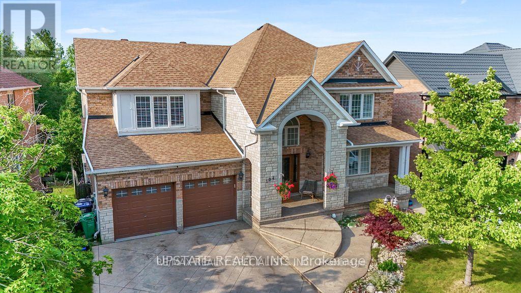 Photo 4 of 104 Treeline Boulevard, Brampton ON