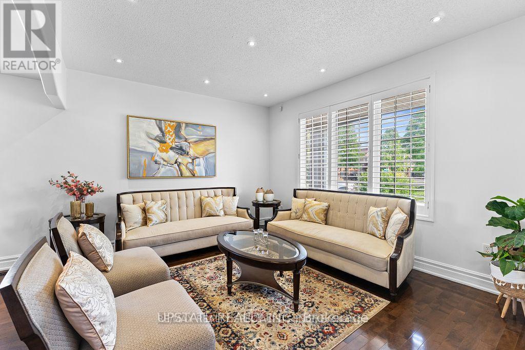 Photo 8 of 104 Treeline Boulevard, Brampton ON