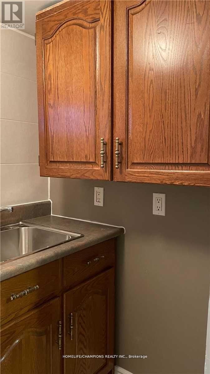 Photo 6 of 65 Whitburn Crescent, Toronto ON