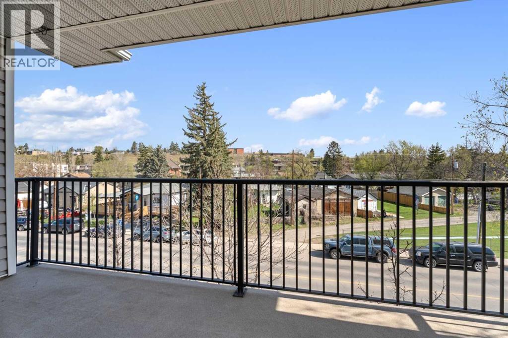 Photo 29 of 303 29 N Railway Street, Okotoks AB