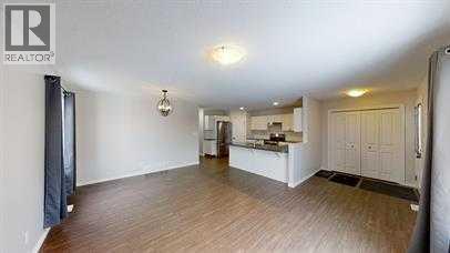 Photo 3 of A 11201 98 Street, Clairmont AB