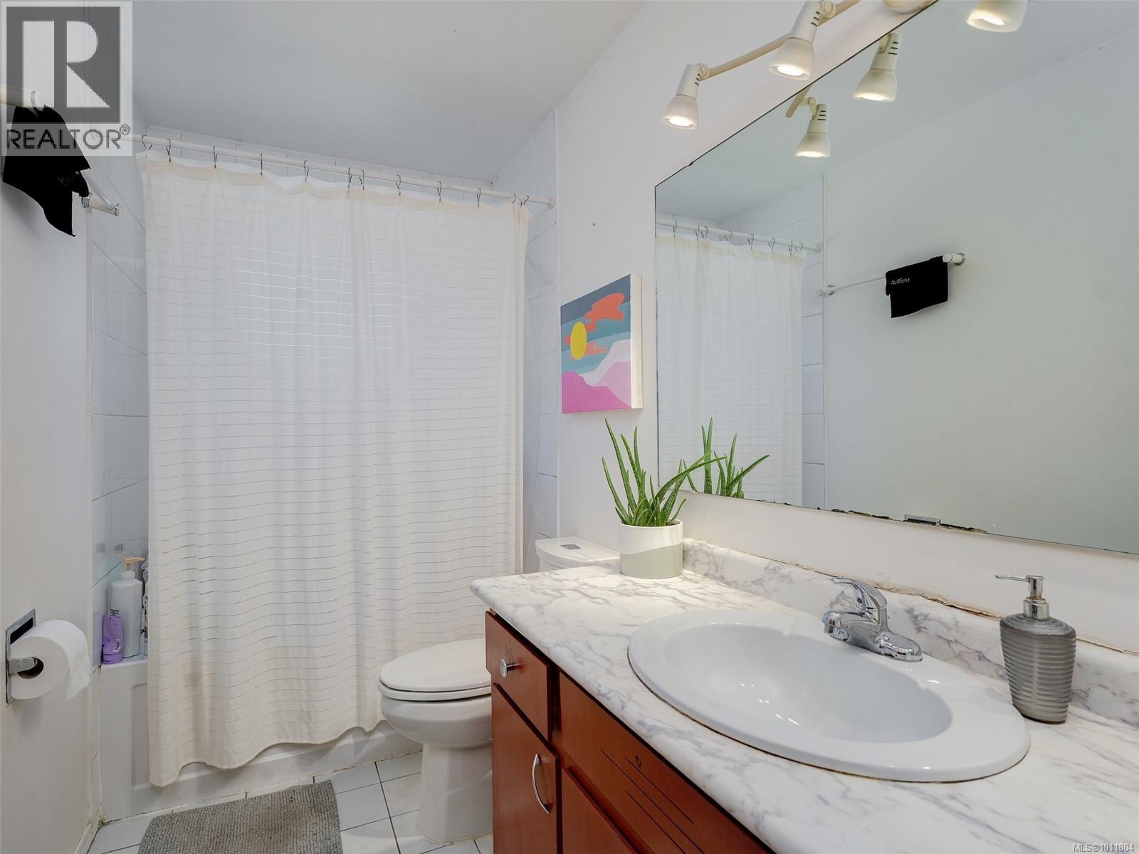 Photo 11 of 3988 Birchwood St, Saanich BC