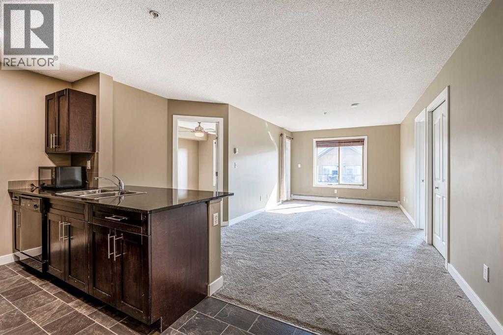 Photo 7 of 1407 403 Mackenzie Way Sw, Airdrie AB