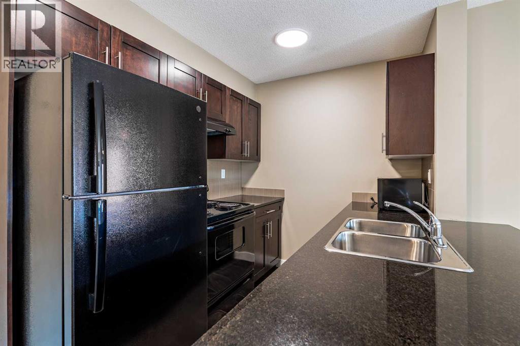 Photo 9 of 1407 403 Mackenzie Way Sw, Airdrie AB