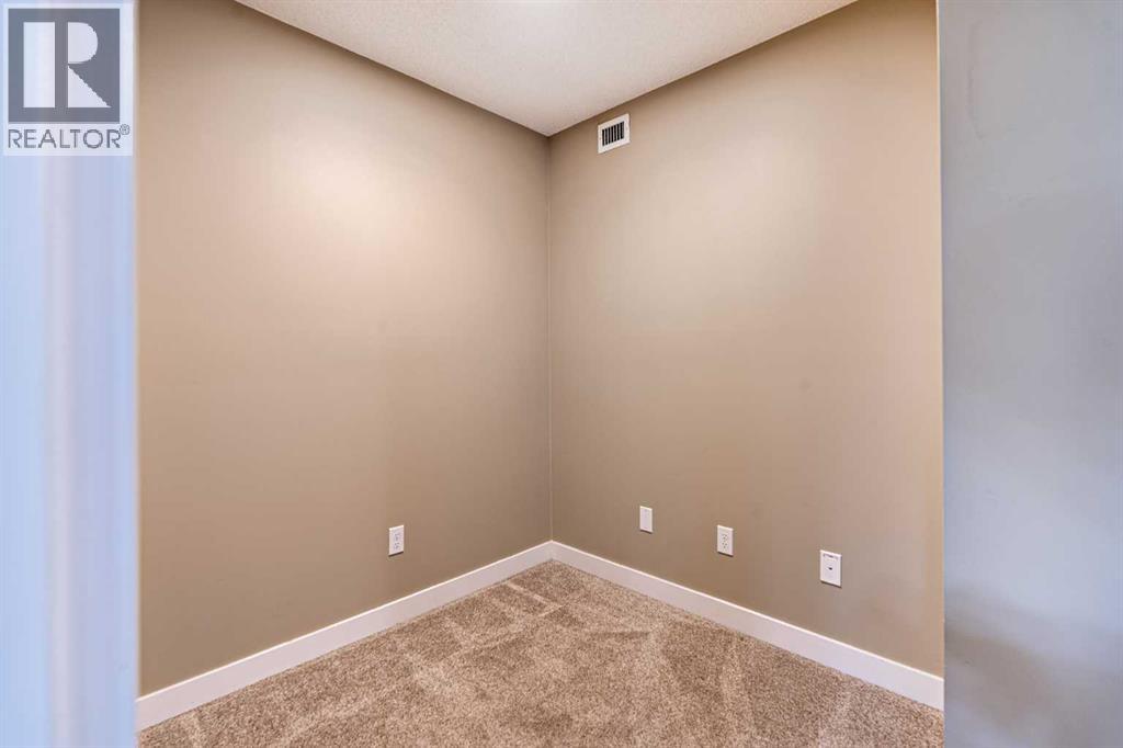 Photo 21 of 1407 403 Mackenzie Way Sw, Airdrie AB