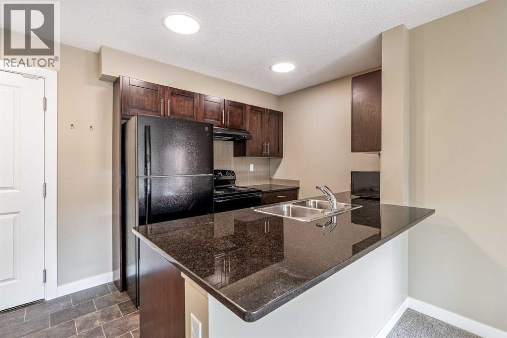 Photo 4 of 1407 403 Mackenzie Way Sw, Airdrie AB