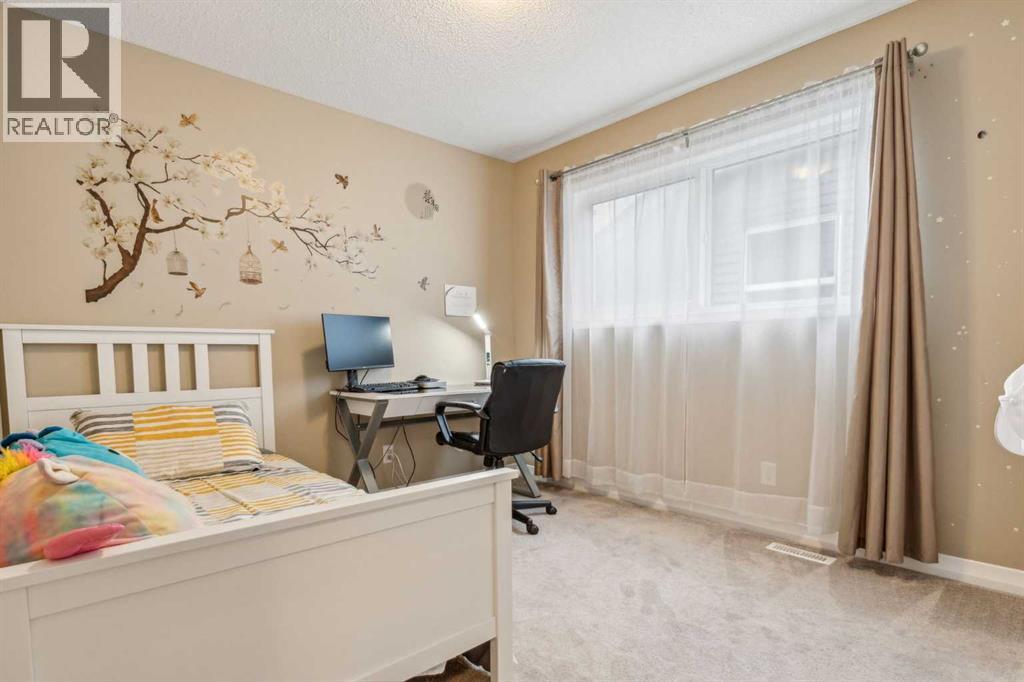 Photo 24 of 111 Buckskin Way, Cochrane AB