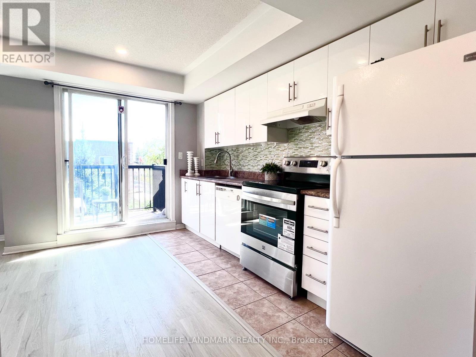 Photo 3 of 310 35 Strangford Lane, Toronto ON