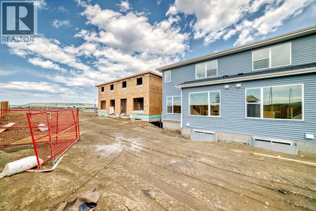 Photo 38 of 116 Southbow Village Way, Cochrane AB