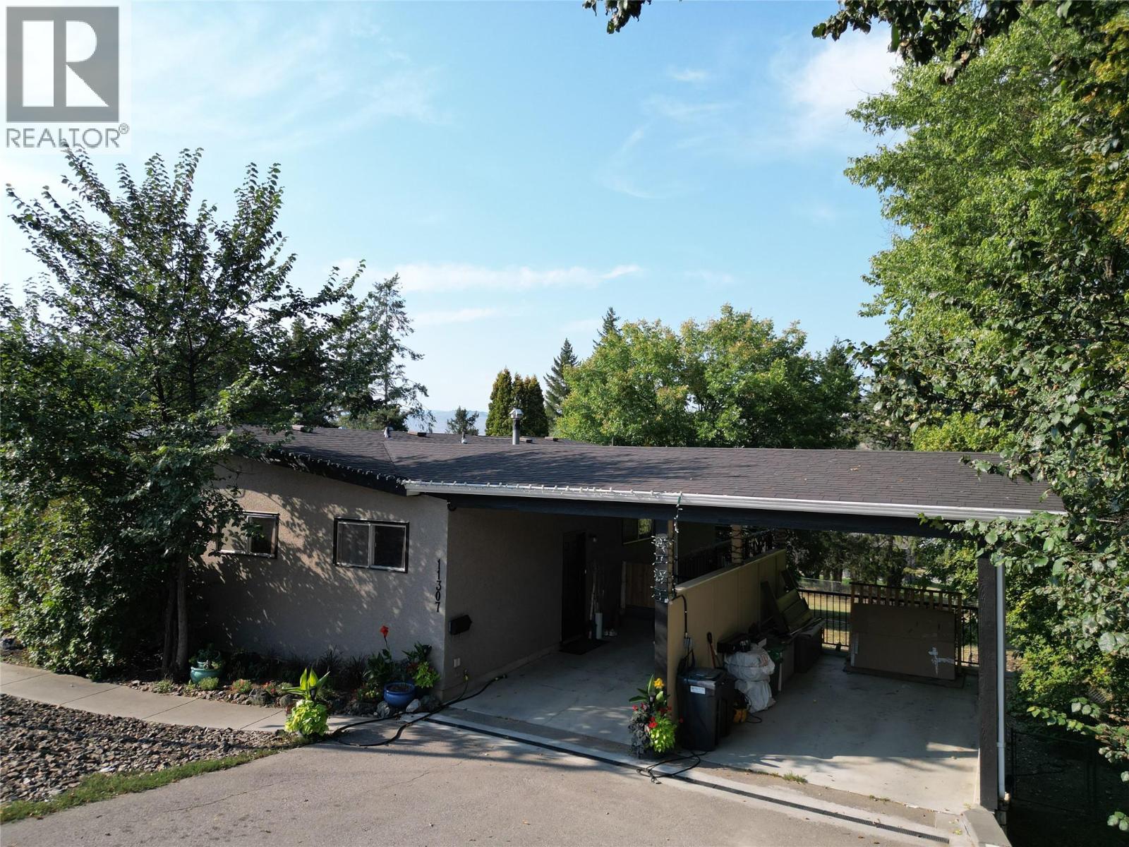 Photo 1 of 11307 Coldstream Creek Road, Coldstream BC
