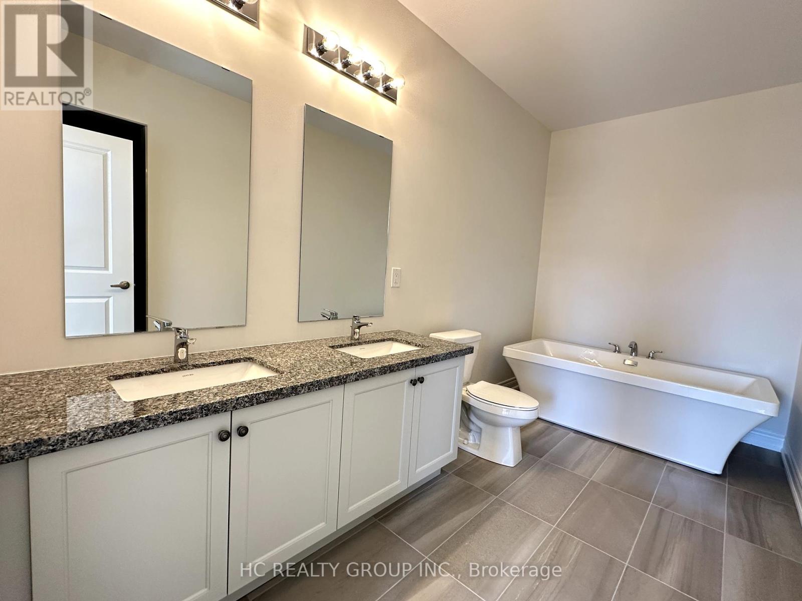 Photo 5 of 561 Vine Cliff Boulevard, Markham ON