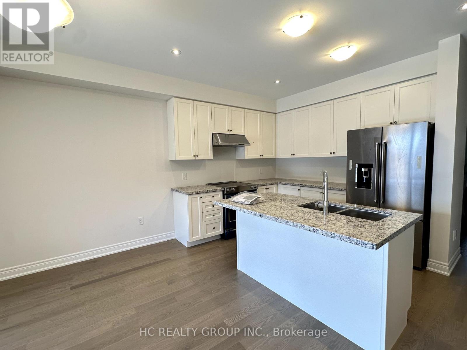 Photo 7 of 561 Vine Cliff Boulevard, Markham ON