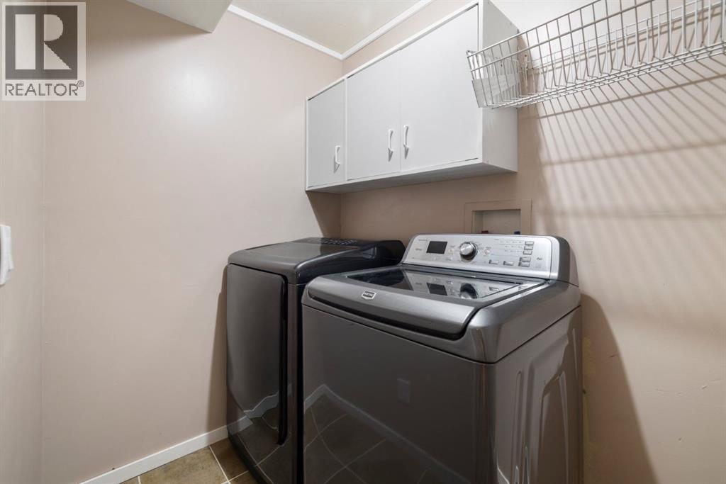 Photo 32 of 31 33 Stonegate Drive Nw, Airdrie AB