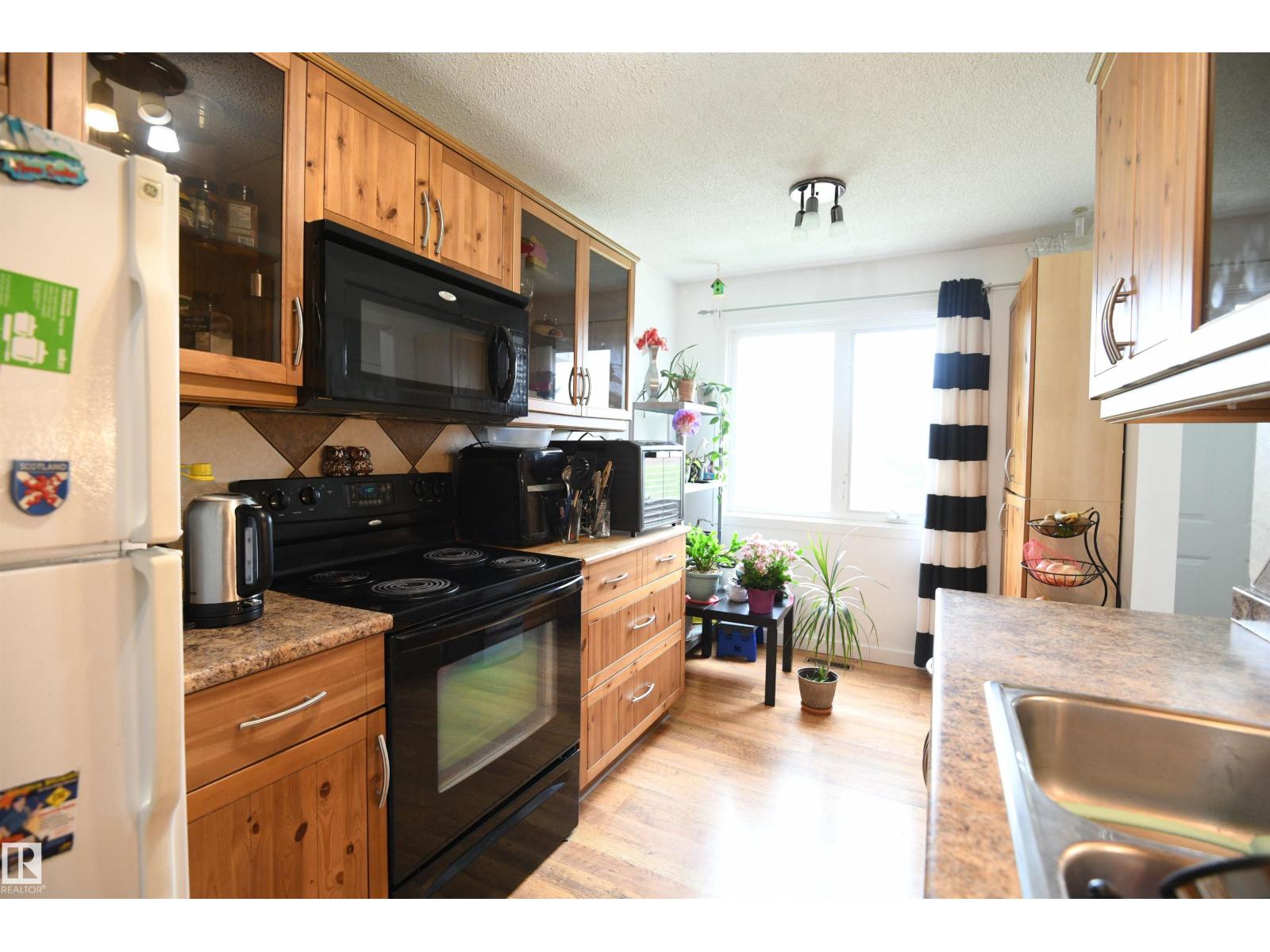 Photo 8 of 227 Callingwood Two Tw Nw, Edmonton AB