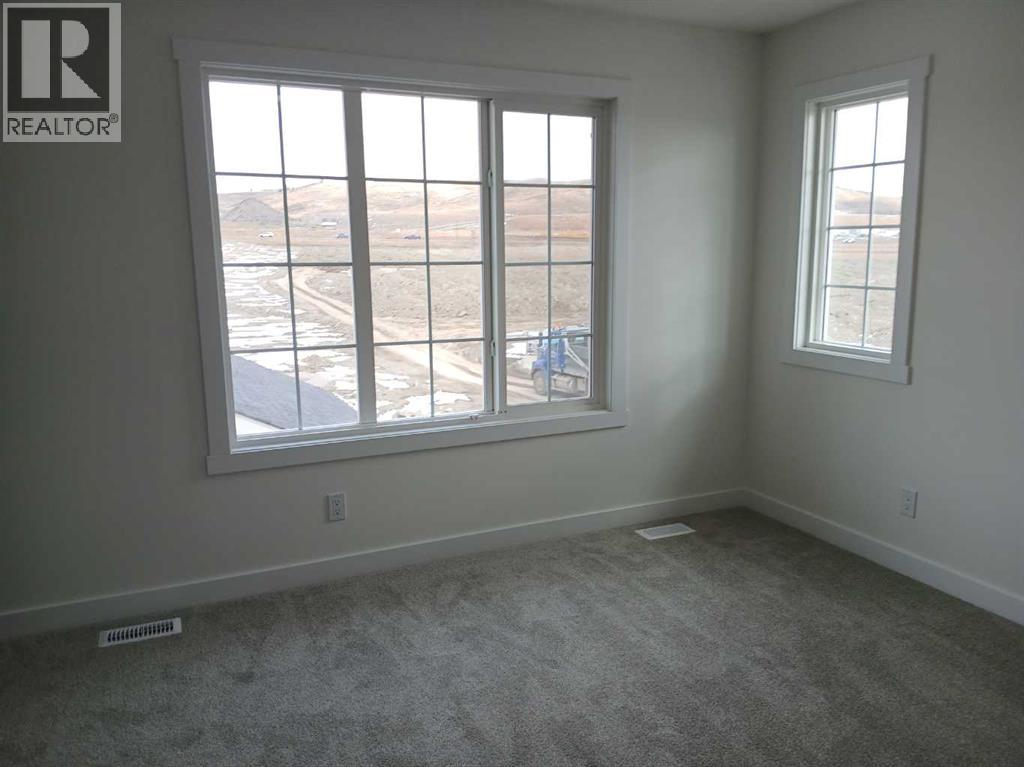 Photo 7 of 392 Heartland Way, Cochrane AB