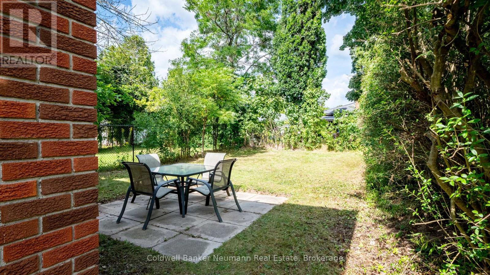 Photo 3 of 54 Conroy Crescent, Guelph ON