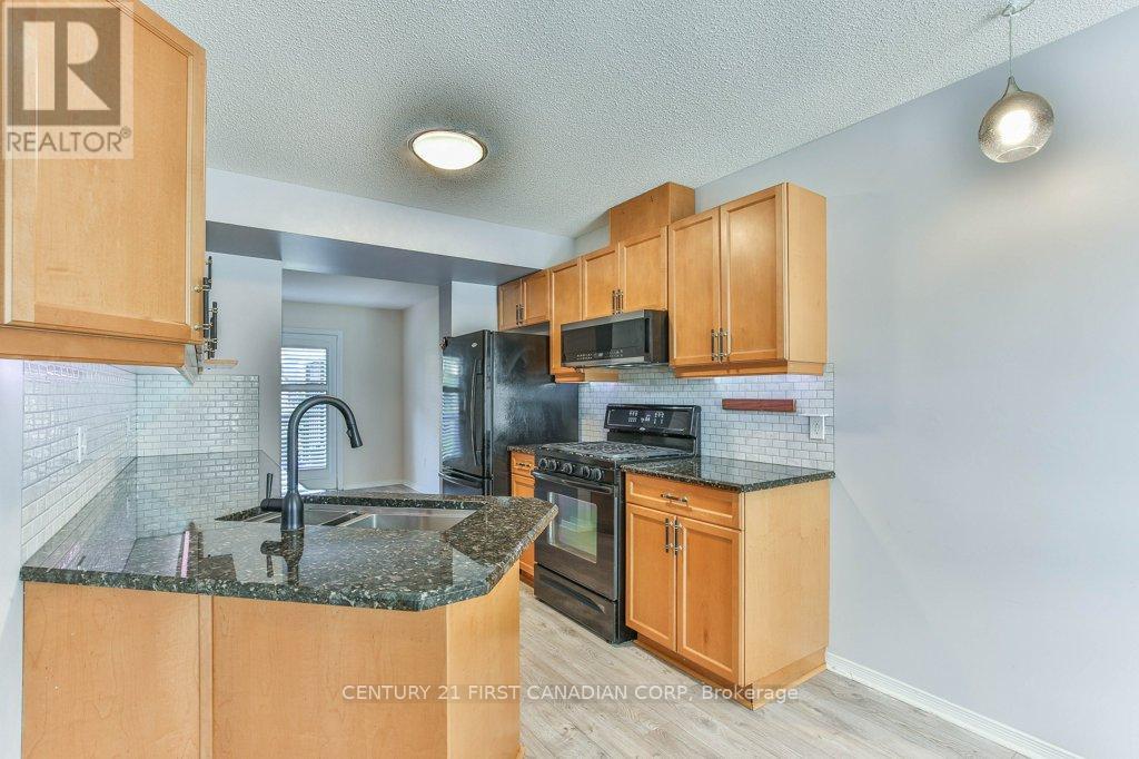 Photo 7 of 1600 Mickleborough Drive, London North ON