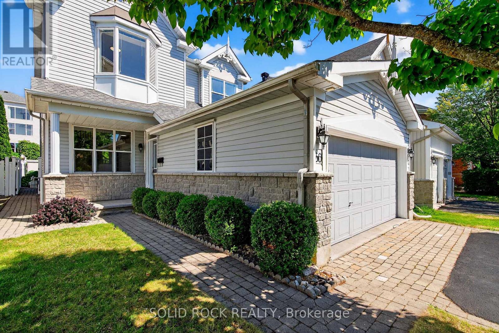 Front landscaping creates a welcoming curb appeal