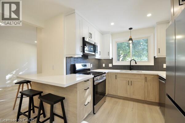 Photo 6 of 30 Grenadier Road, Cambridge ON
