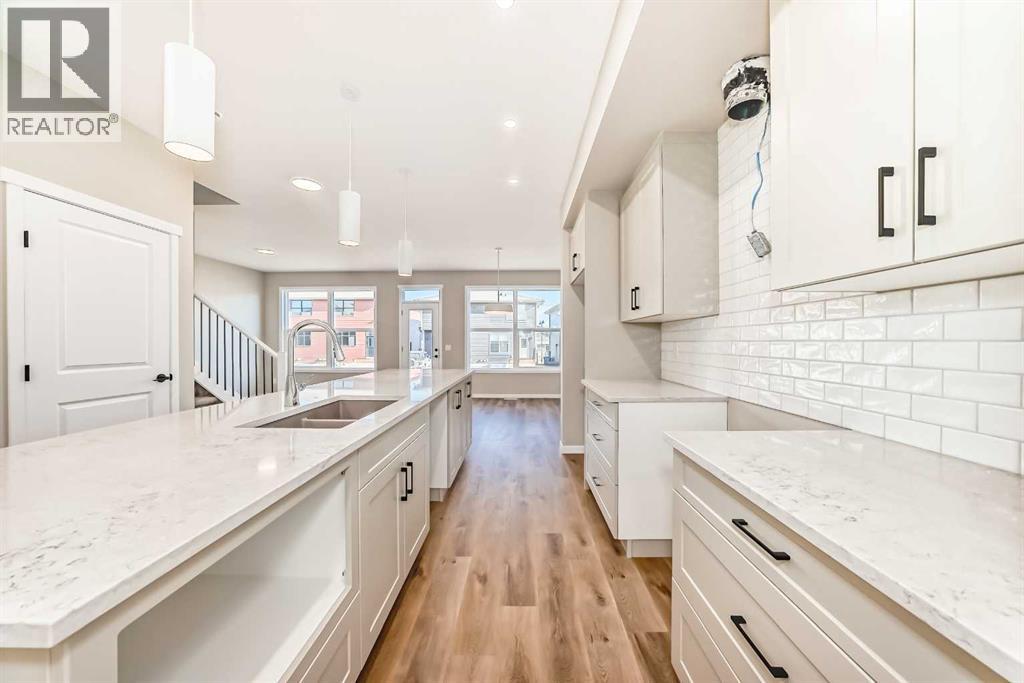 Photo 10 of 28 Magnolia Green Se, Calgary AB