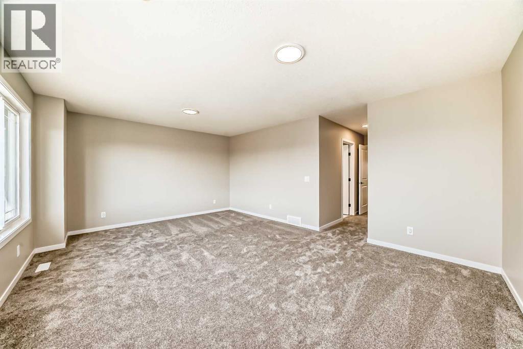 Photo 24 of 28 Magnolia Green Se, Calgary AB