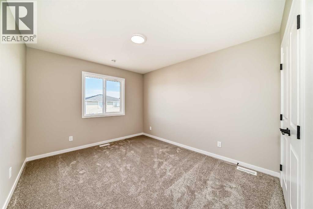 Photo 29 of 28 Magnolia Green Se, Calgary AB