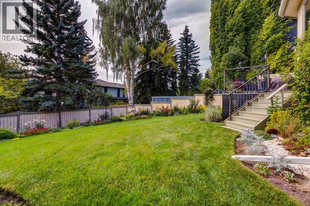 Photo 12 of 79 Woodhaven Road Sw, Calgary AB