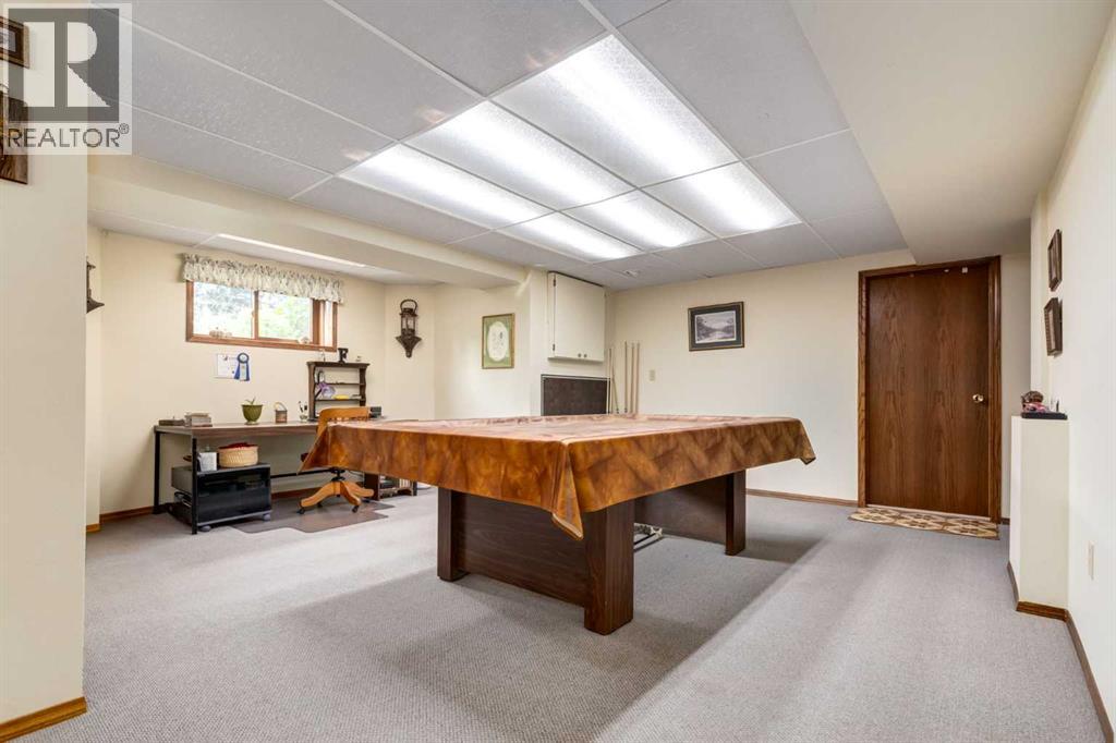 Photo 37 of 79 Woodhaven Road Sw, Calgary AB