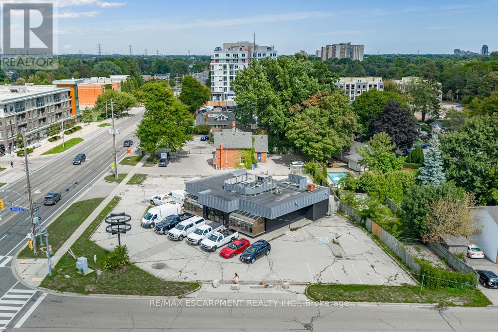 Photo 3 of 434 Plains Road E, Burlington ON