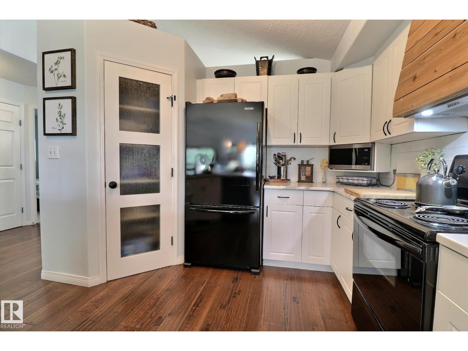 Photo 7 of 4343 Mcmullen Wy Sw, Edmonton AB