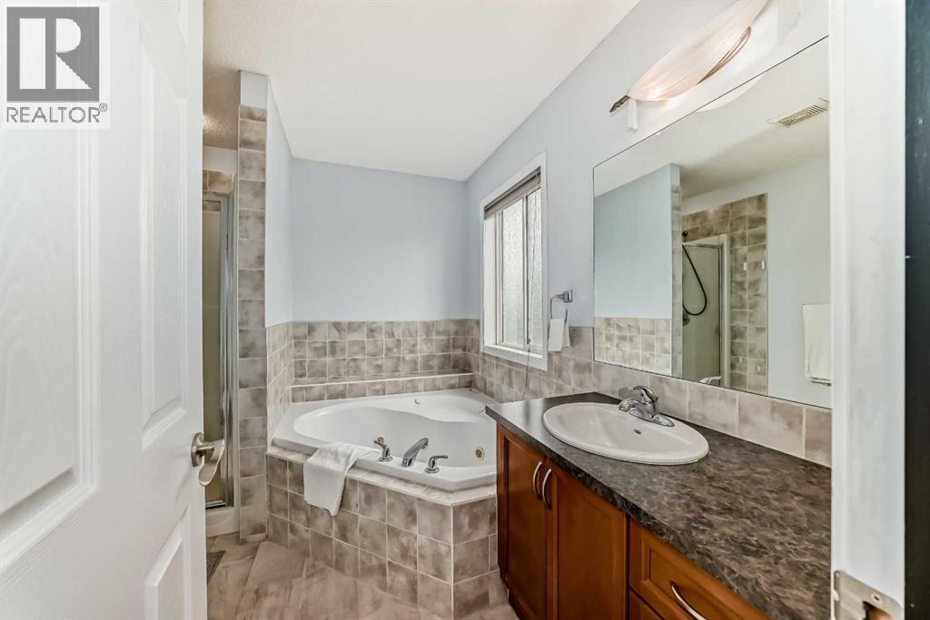 Single Family House 4 Level for Sale in  Covepark Green NE Coventry Hills Calgary 