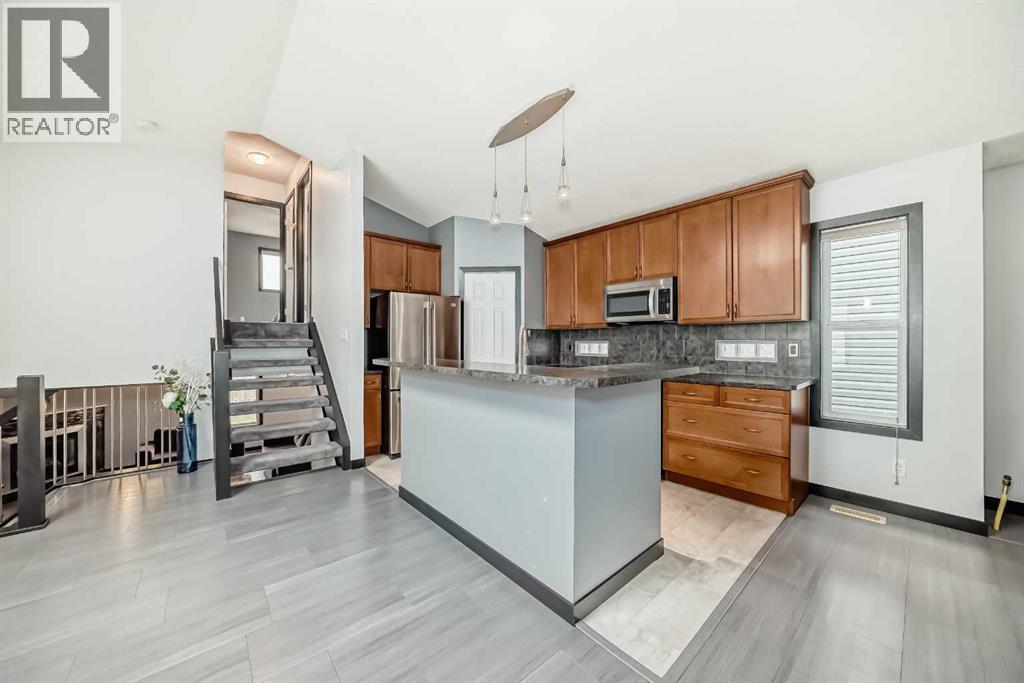 Single Family House 4 Level for Sale in  Covepark Green NE Coventry Hills Calgary 