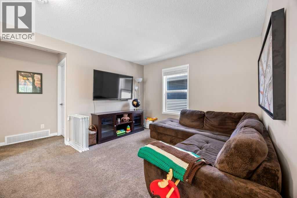 Photo 20 of 512 River Heights Green, Cochrane AB
