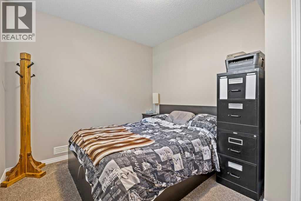 Photo 32 of 512 River Heights Green, Cochrane AB