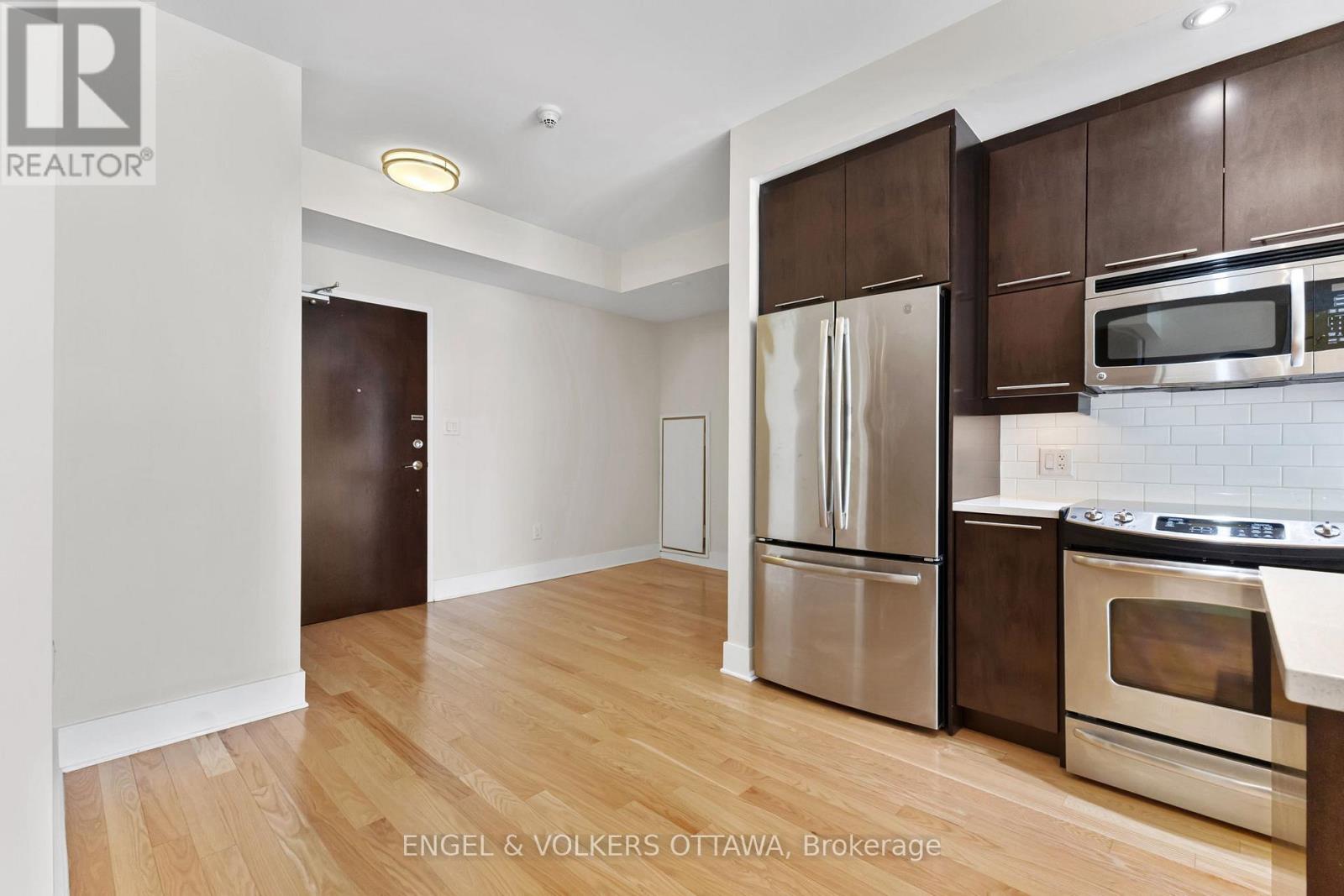 The den area provides an open concept flex space