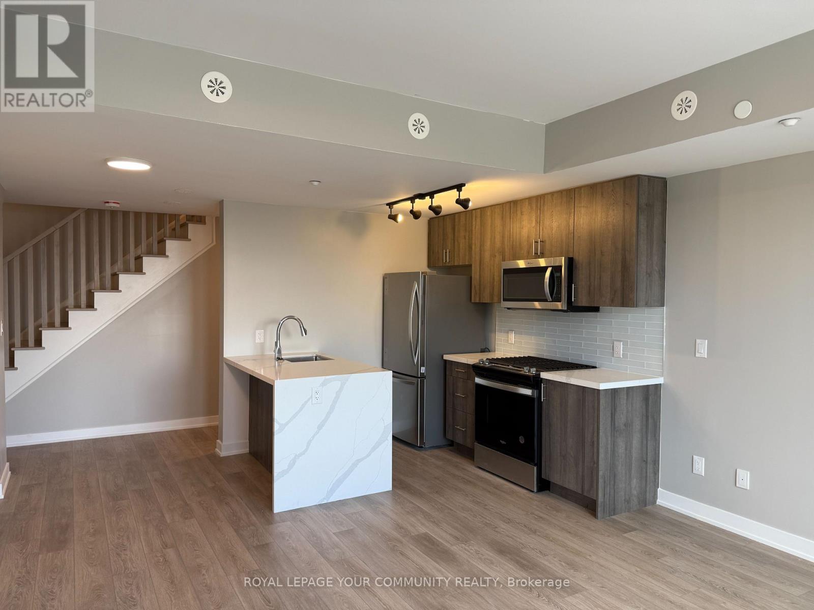 Photo 3 of 1 1455 Oconnor Drive, Toronto ON