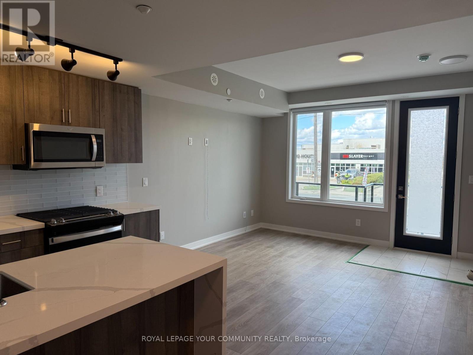 Photo 4 of 1 1455 Oconnor Drive, Toronto ON