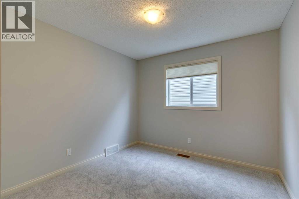 Photo 13 of 12 Aspen Hills Court Sw, Calgary AB