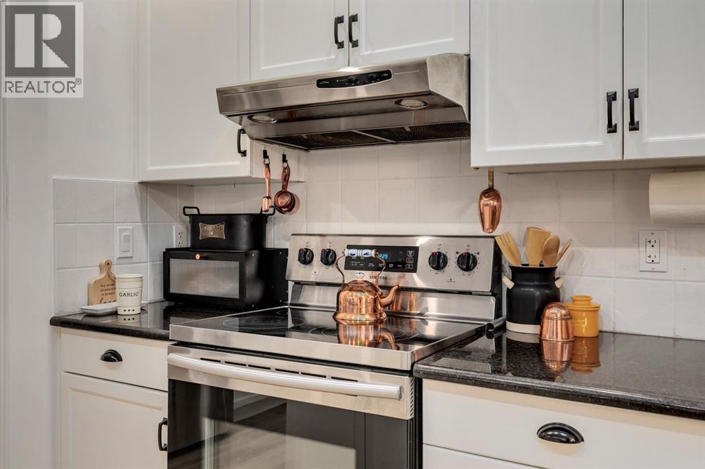 Photo 10 of 1209 Kingsland Road Se, Airdrie AB