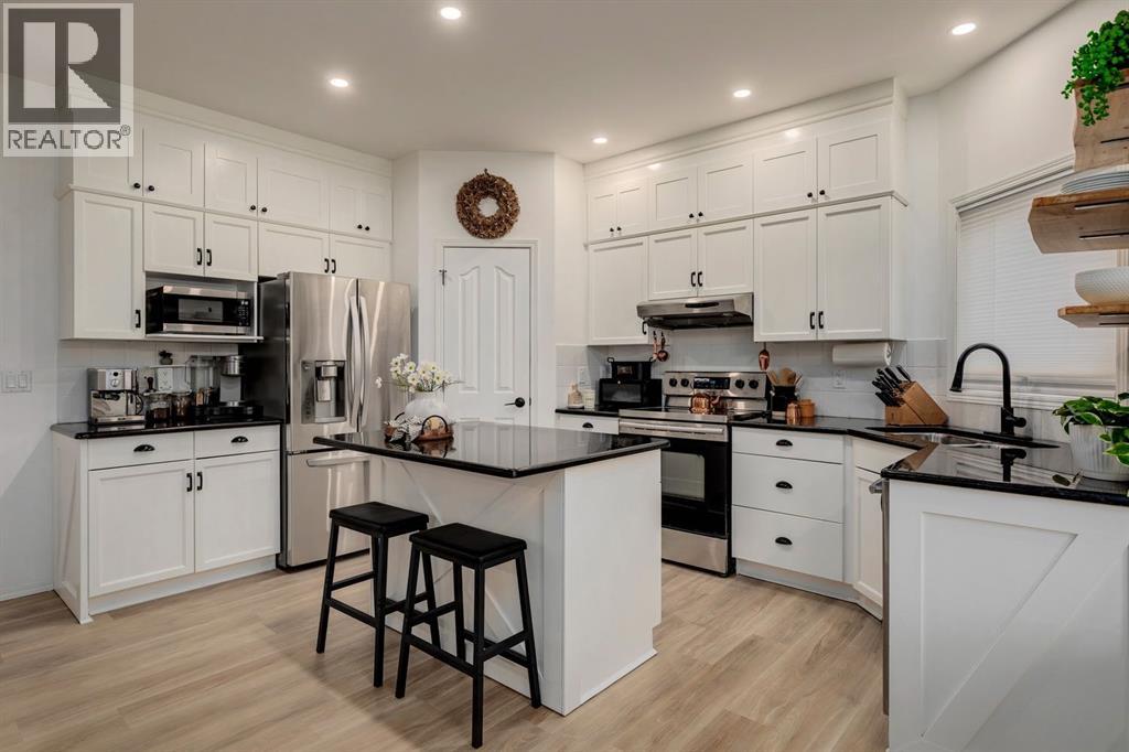 Photo 9 of 1209 Kingsland Road Se, Airdrie AB