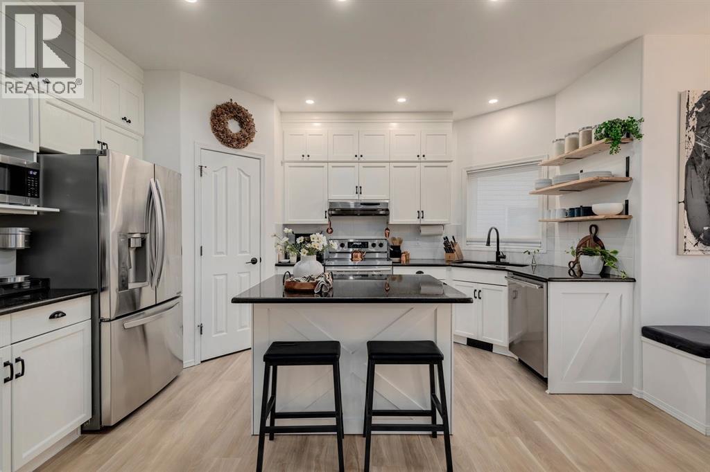 Photo 8 of 1209 Kingsland Road Se, Airdrie AB