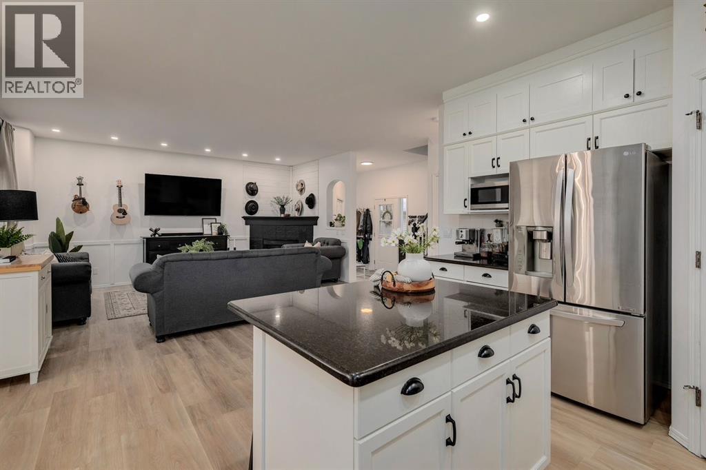 Photo 11 of 1209 Kingsland Road Se, Airdrie AB