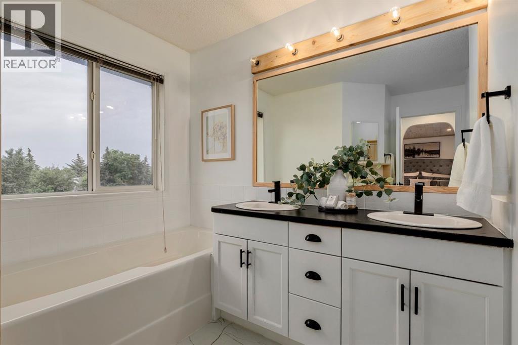 Photo 30 of 1209 Kingsland Road Se, Airdrie AB
