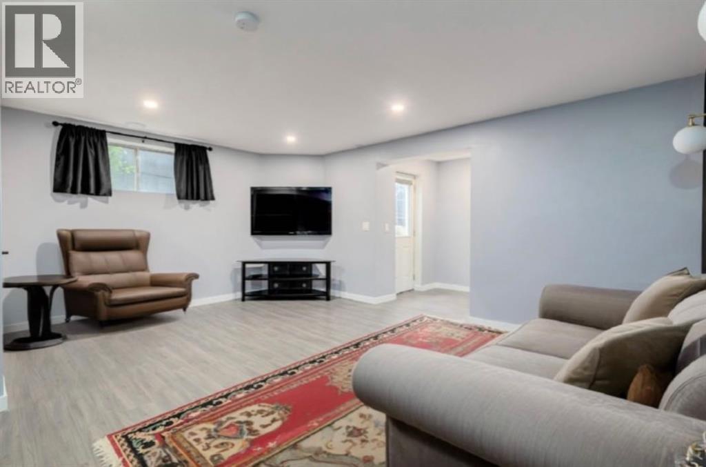 Photo 33 of 1209 Kingsland Road Se, Airdrie AB